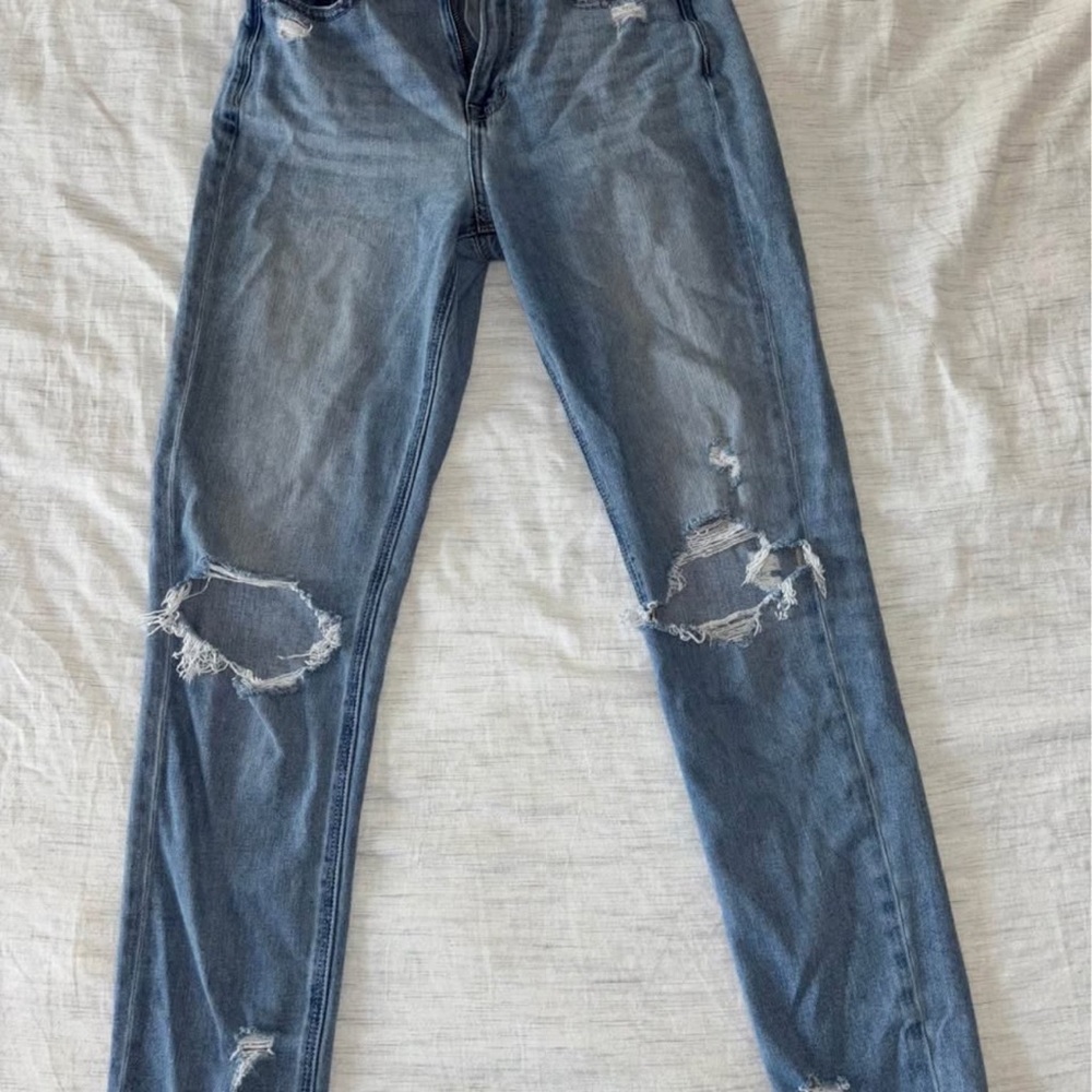 Women's Distressed Blue Jeans